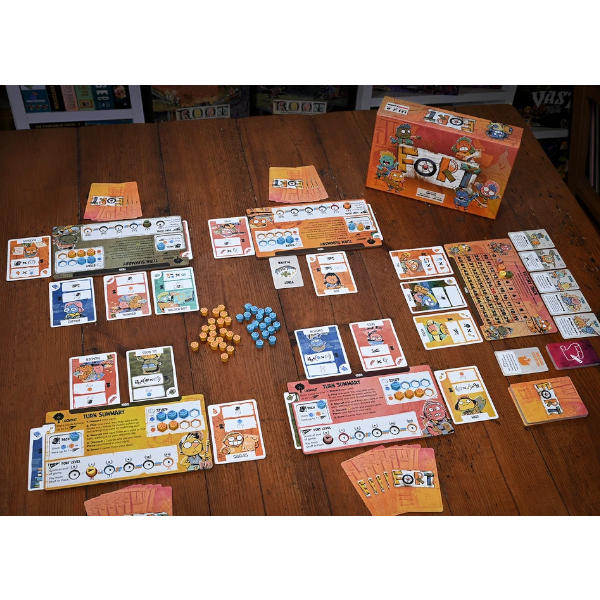 Collection of board game cards and pieces from the board game 'Fort' on a wooden table