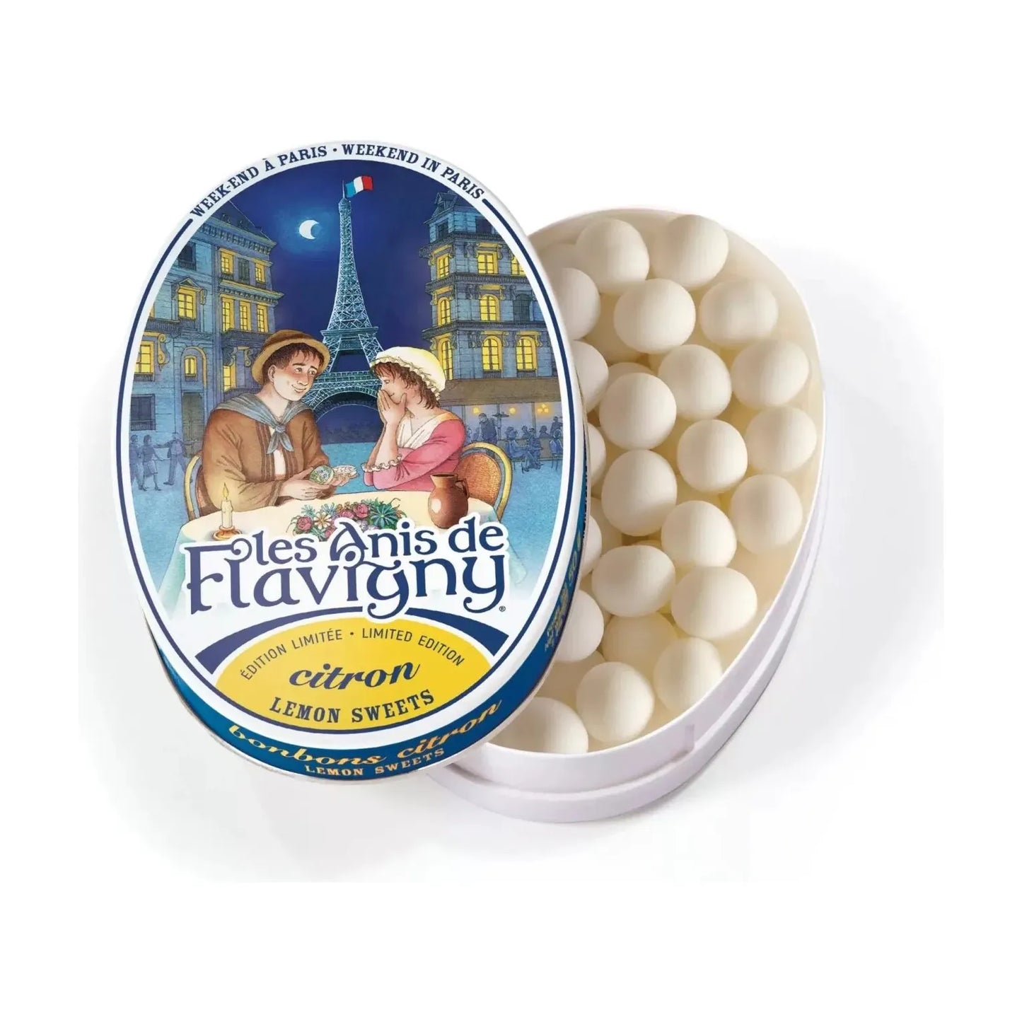 The Twice as Sweet Anis De Flavigny Lemon Limited Edition 50g (France) features an oval tin with a Paris couple by the Eiffel Tower on the lid and contains white round lemon candies inside.