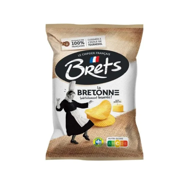 A 125g bag of Twice as Sweet Brets Salted Butter Chips (France) shows a woman in Breton dress dancing, with images of the chips and nutritional labels on beige, black, and white packaging.