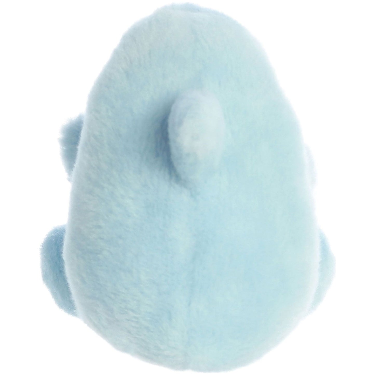The Palm Pal Clicks Dolphin by Twice as Sweet is a light blue, fuzzy plush toy with a small tail and two short arms, seen from behind with no visible face—perfect for any aquatic theme.