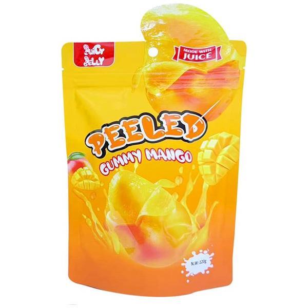 A yellow-orange pouch labeled Juicy Jelly Peeled Gummy Mango 120g (China) by Twice as Sweet features sliced mango and gummy images, with “Fruity Snack” and “Juicy Jelly” highlighted at the top. Net weight: 120g.