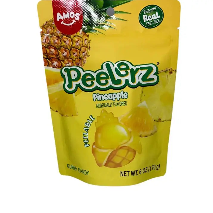 A yellow pouch of Twice as Sweet Peelerz Gummy Pineapple 170g (China), featuring fresh pineapple images and pineapple-shaped gummies. The packaging boasts “Made with Real Fruit Juice,” making it a true tropical delight. Net weight: 6 oz (170 g).