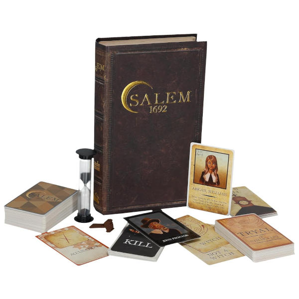 Salem 1692 game components with cards and hourglass on a white background