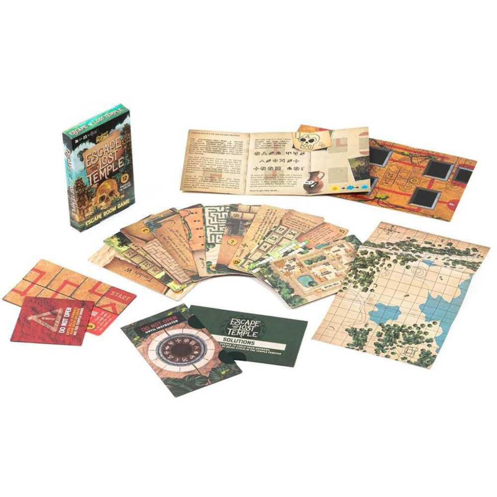 Escape the Lost Dungeon board game components laid out on a white background, including the game box, cards, map, and booklet.