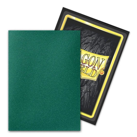 A green textured card protector sheet partially covering a black card sleeve with a yellow border and the Dragon Shield logo, on a white background.