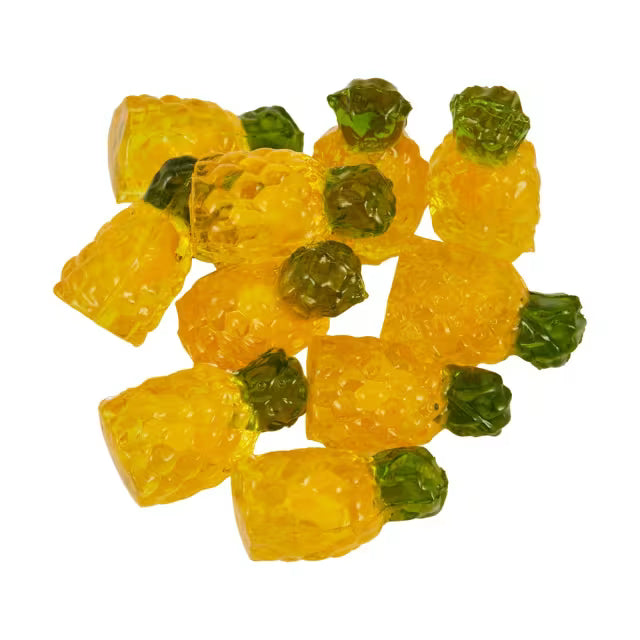 A pile of yellow, pineapple-shaped Amos 4D Fruit Gummy Pineapple Burst candies (140g) from Twice as Sweet, featuring green tops and arranged on a white background.