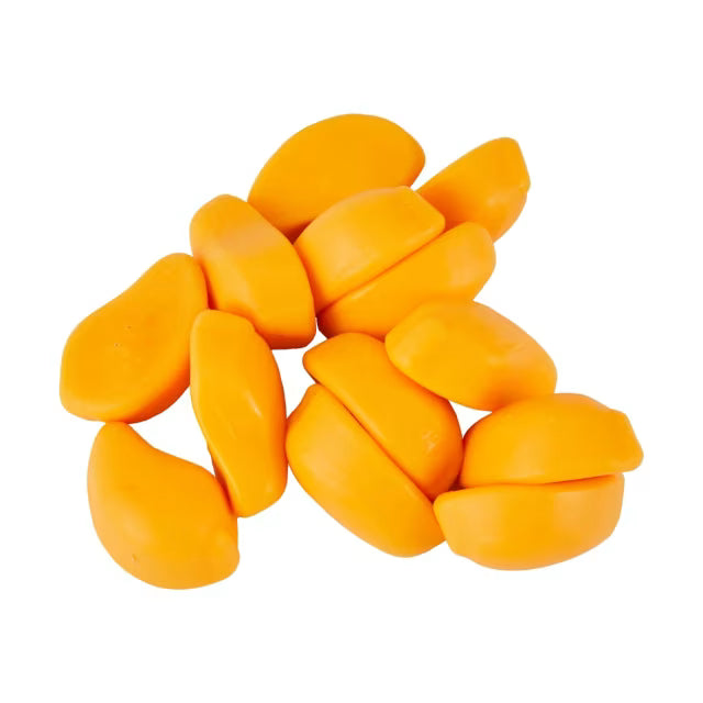 Several pieces of sliced bright orange mango evoke the sweet look of Twice as Sweet Amos Peelerz Gummy Mango 150g (China), arranged on a white background in a scattered pile.