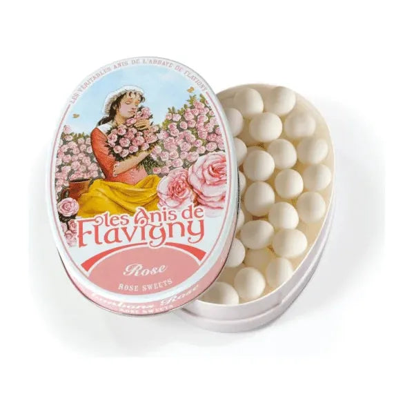 Twice as Sweet Anis De Flavigny Rose 50g (France): oval tin with a vintage-style woman holding pink roses on the lid, classic French white candies visible inside.