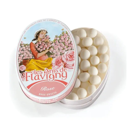 Twice as Sweet Anis De Flavigny Rose 50g (France): oval tin with a vintage-style woman holding pink roses on the lid, classic French white candies visible inside.