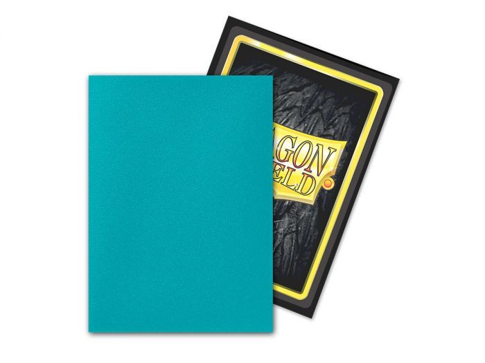 Teal card sleeves with a Dragon Shield branded black and yellow box on a white background