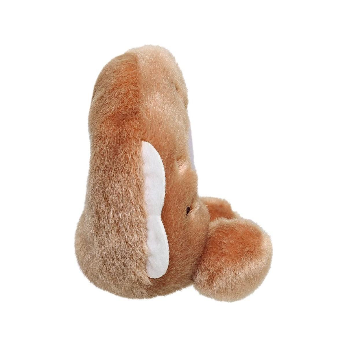 A soft, brown Palm Pal Tony Everything Bagel plush toy by Twice as Sweet, featuring floppy ears and white inner ear patches, shown from the side against a plain white background.