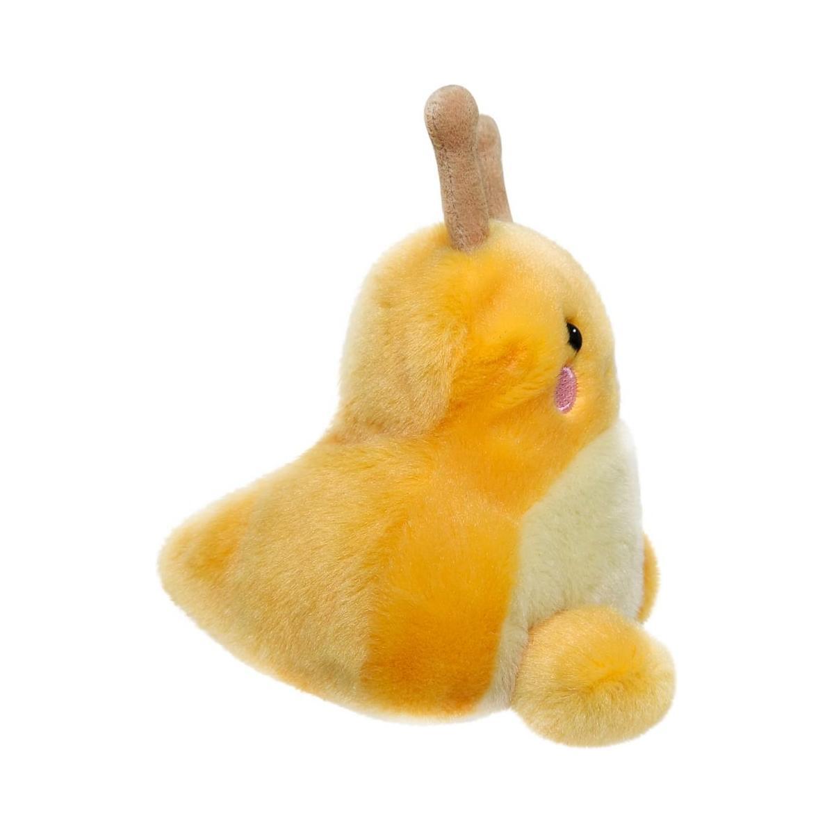 The Palm Pal Emily Banana Slug by Twice as Sweet is a plush toy shaped like a yellow and orange snail, featuring brown antennae, pink cheeks, and a soft, fluffy texture, shown against a white background.