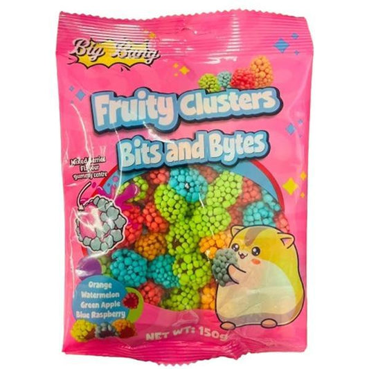 A 150g pink bag of Twice as Sweet Big Bang Fruity Clusters Bits and Bytes from the USA, featuring colorful gummy clusters in orange, watermelon, green apple, and blue raspberry flavors with a cute cartoon hamster on the packaging.