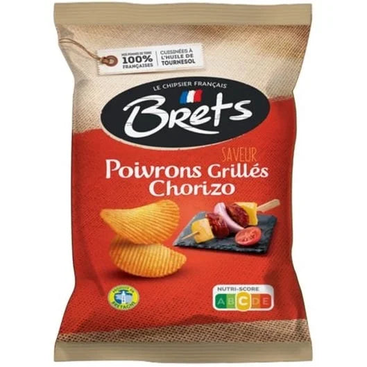 Twice as Sweet Brets Capsicum and Chorizo Chips 125g (France) come in a red pack showing ridged, spicy chips with grilled chorizo and peppers. The “Poivrons Grillés Chorizo” flavor and Nutri-Score label are displayed.