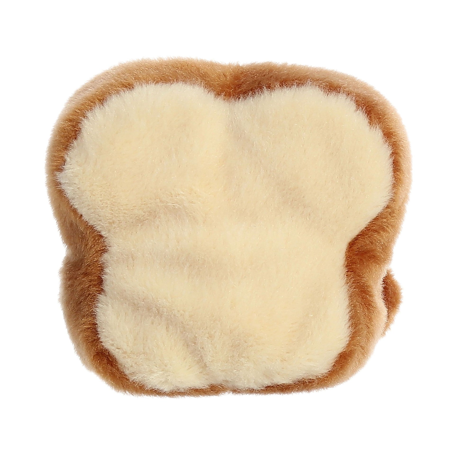 The Twice as Sweet Palm Pal Buttery Toast is a palm-sized plush toy shaped like a slice of bread with light brown edges and a soft cream center—perfect for breakfast plush lovers.