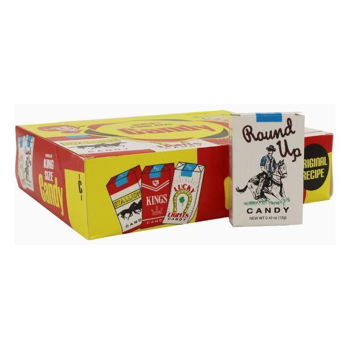 A box of Twice as Sweet Candy Cigarettes 12g (USA) features retro candy cigarette packaging with three illustrated packs on the box and one standing upright in front.