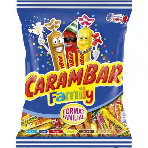 A blue 450g bag of Twice as Sweet Carambar Family (France) caramel chews, featuring cartoon mascots, colorful wrapped candies, and bold Carambar Family text with Format Familial highlighted in a yellow circle.