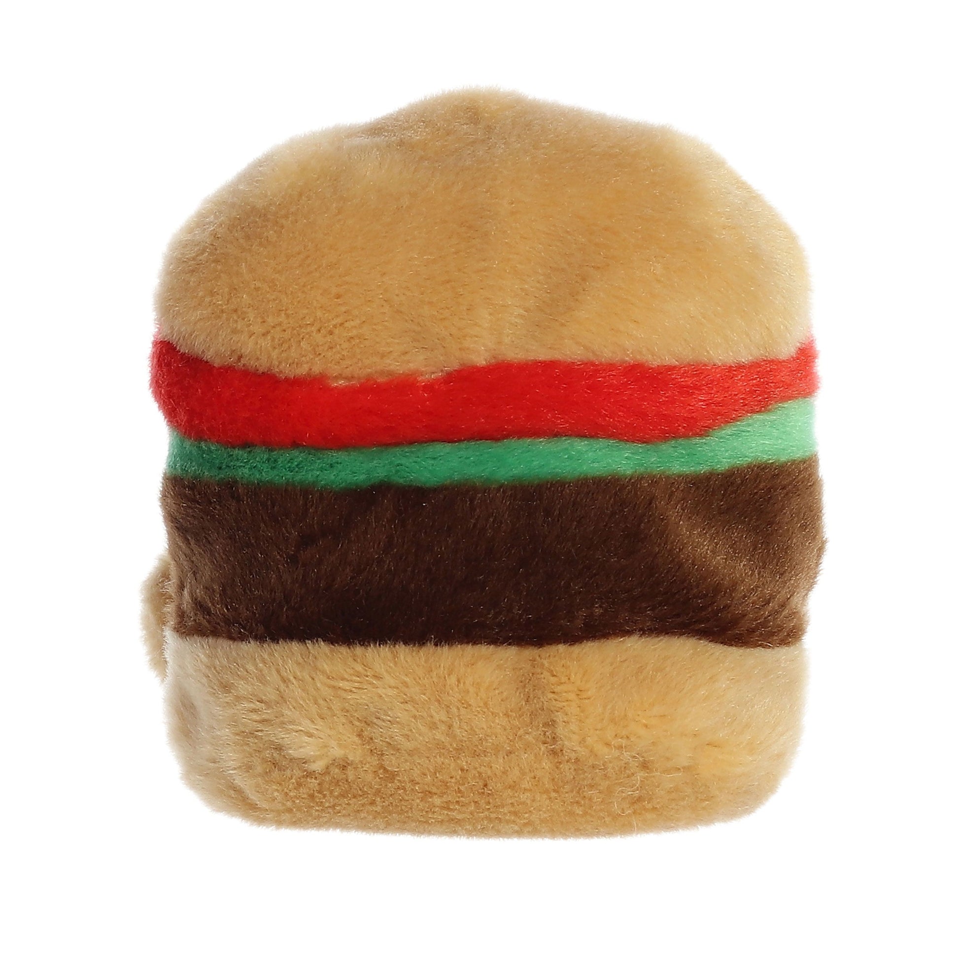Meet Palm Pal Charles Cheeseburger by Twice as Sweet—a cute plush toy shaped like a hamburger, featuring tan, brown, red, and green details for the bun, patty, tomato, and lettuce.