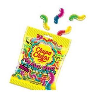 A yellow 90g bag of Twice as Sweet Chupa Chups Mini Crawlers Jelly Candy (China) with colorful gummy worms spilling out above playful, bright packaging design. The candies come in assorted vibrant colors.