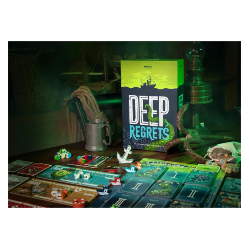 The board game 'Deep Regrets' displayed on a dark wooden table with thematic props like a metal mug, rope, and a hookah, featuring its lime green and black box and various game boards.