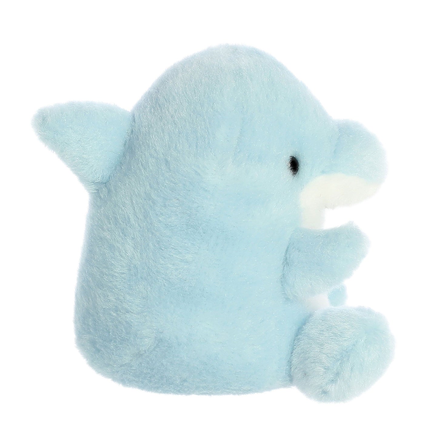 The Twice as Sweet Palm Pal Clicks Dolphin is a soft, light blue plush with small fins, a round body, and black eyes. Sitting upright and facing right, it has white details on its mouth and belly—perfect as an ASMR buddy!.