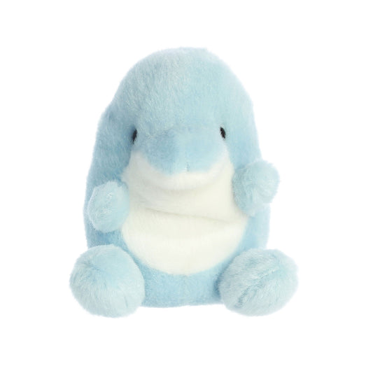 The Twice as Sweet Palm Pal Clicks Dolphin is a small, light blue plush with a white belly and round flippers. This chubby, aquatic-themed ASMR buddy sits upright with black bead eyes against a white background.