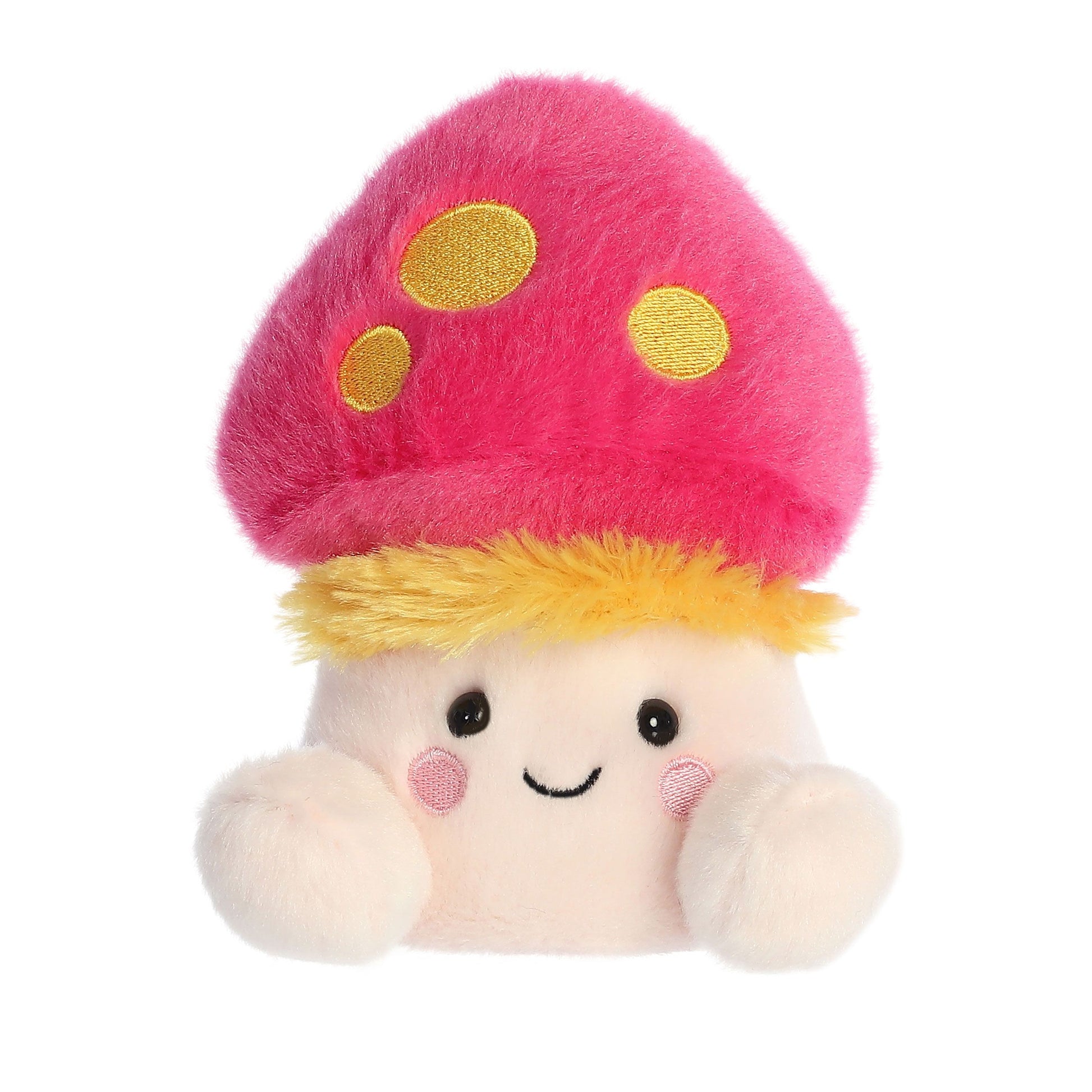 Meet Palm Pal Favio Fluffy Mushroom from Twice as Sweet—a charming plush with a pink cap and yellow spots, yellow trim, blushing cheeks, and fuzzy round arms, inspired by a storybook mushroom character.