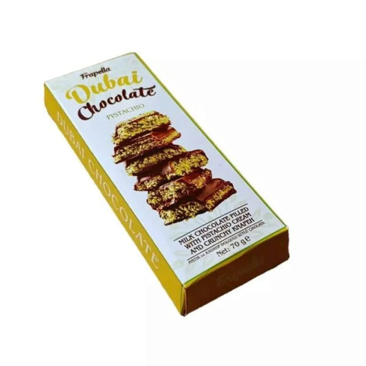 A 70g rectangular box of Twice as Sweet Frapella Dubai Chocolate with Pistachio Cream (France), featuring stacked milk chocolate pieces filled with pistachio cream, in white and yellow packaging with gold accents.