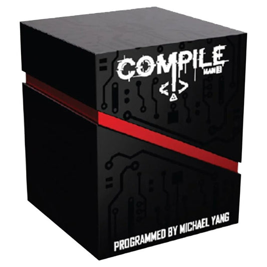 Card game box featuring a black cube-shaped box with circuit board graphics, a red horizontal stripe, and white text reading 'COMPILE MAIN 3' and 'PROGRAMMED BY MICHAEL YANG' on a plain white background. Packaging for the card game "Compile Main 3"