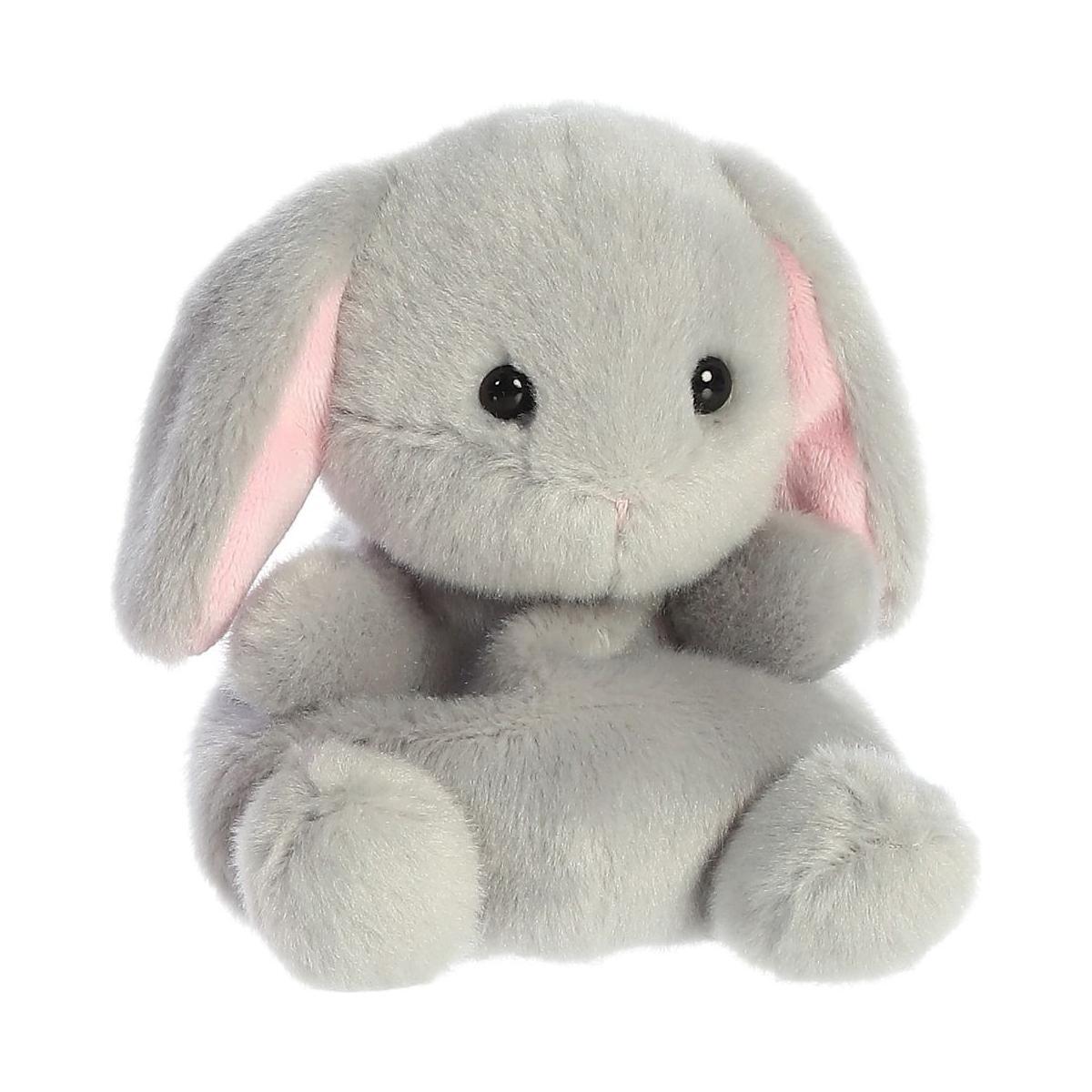 The Twice as Sweet Palm Pal Pebbles Bunny is a soft, slate-grey plush toy with floppy pink-lined ears, black button eyes, and a small nose, sitting upright against a white background.