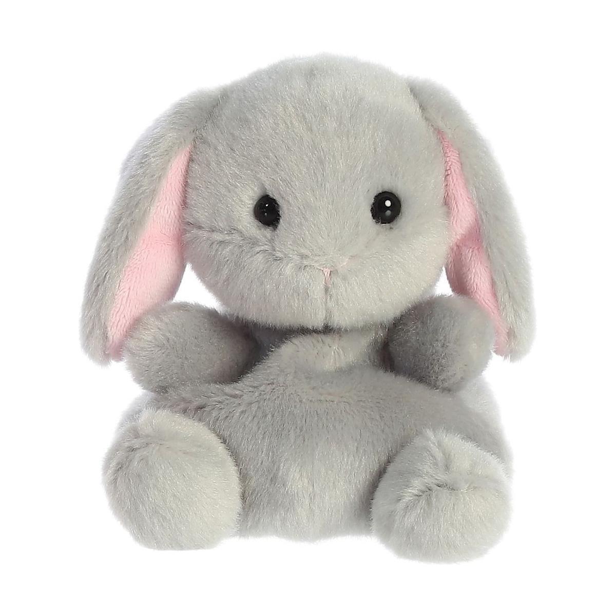 The Twice as Sweet Palm Pal Pebbles Bunny features soft slate-grey fur, floppy pink-lined ears, black button eyes, and a round body, sitting upright against a white background.