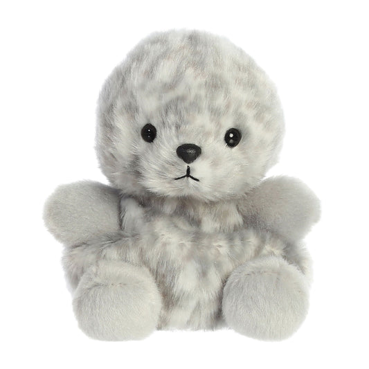 The Twice as Sweet Palm Pal Marina Harbour Seal is a palm-sized plush toy with light gray fur, darker spots, black eyes, and a small black nose, sitting upright against a white background.