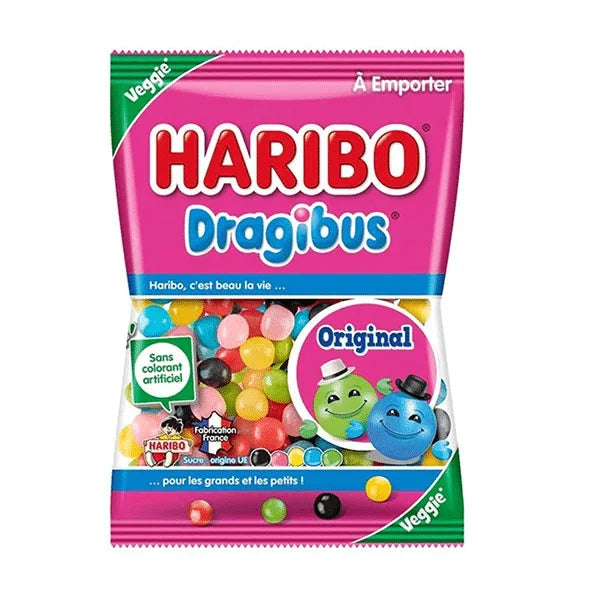 A vibrant bag of Haribo Dragibus (France) from Twice as Sweet features assorted fruity chewy candies, two smiling cartoons, a pink top, and labels for “Veggie” and “Sans colorant artificiel.”.