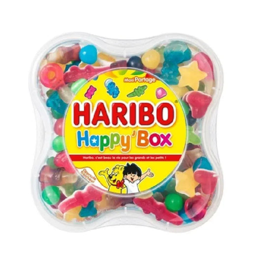 The Twice as Sweet Haribo Happy Box 600g (France) is a plastic container filled with colorful, fun-shaped Haribo gummies. The bright lid features cartoon mascots and playful text for a delightful gummy candy experience.