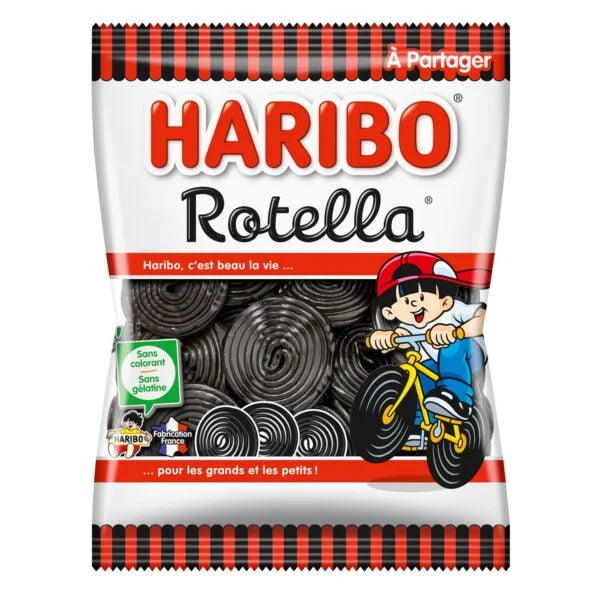 A 120g bag of Haribo Rotella chewy licorice wheels from France by Twice as Sweet, in red, white, and black packaging featuring a cartoon child on a yellow bicycle with French text and images of the classic licorice wheels.