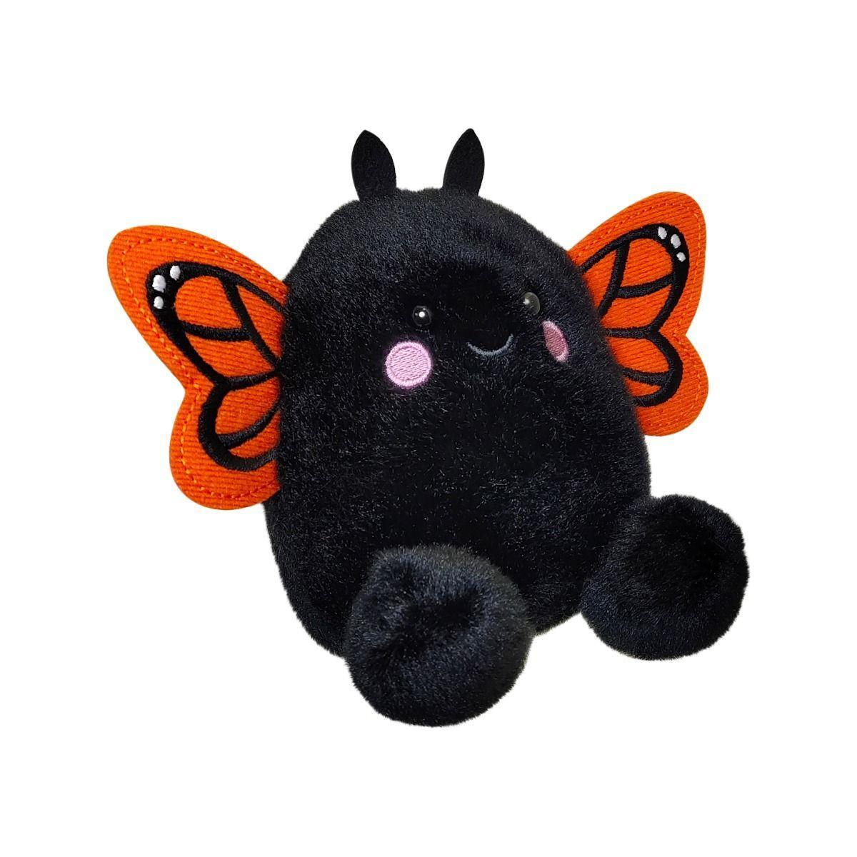 Twice as Sweet’s Palm Pal Reyna Monarch Butterfly is a plush with a round black body, pink cheeks, black antennae, a small smile, big fluffy feet, and vibrant orange-and-black monarch wings—shown on a white background.