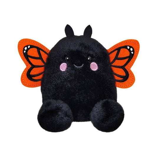 The Twice as Sweet Palm Pal Reyna Monarch Butterfly plush features a round black body, pink cheeks, black antennae, and bright orange monarch wings with black and white details, sitting on a white background.