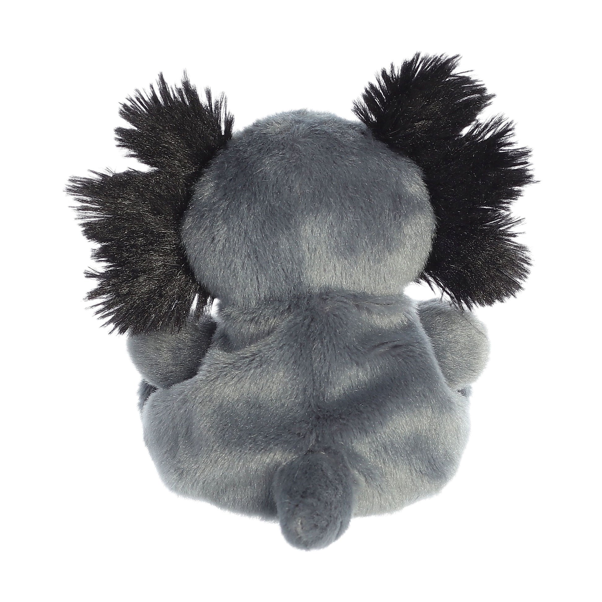 The Twice as Sweet Palm Pal Onyx Axolotl plushie is shown from the back, featuring soft gray fabric, black fluffy ears, and a small tail while sitting upright against a white background.