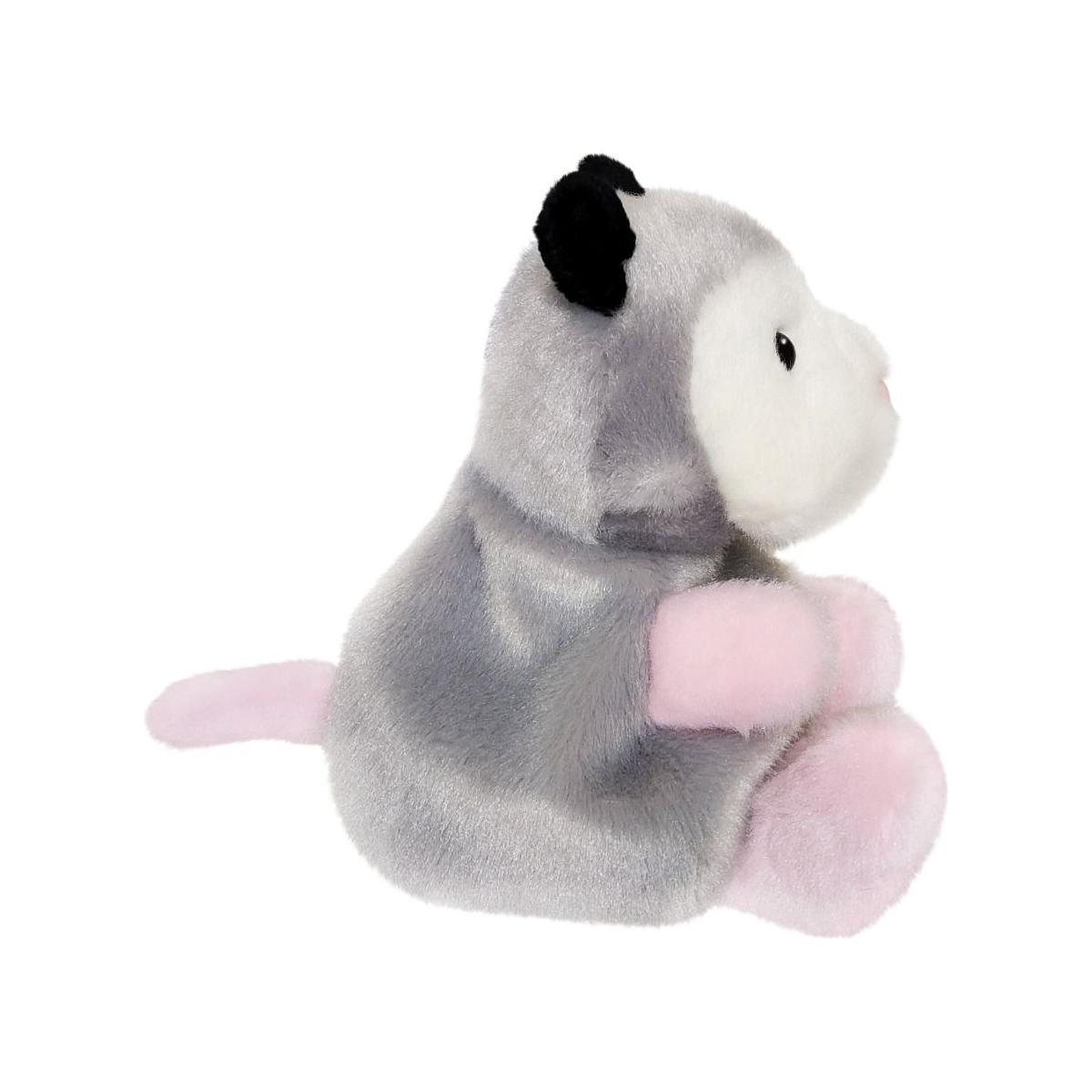 The Twice as Sweet Palm Pal Sherri Opossum is a plush opossum toy with soft gray fur, black ears, a white face, pink paws, and a pink tail—adorably upright and perfect for all ages.