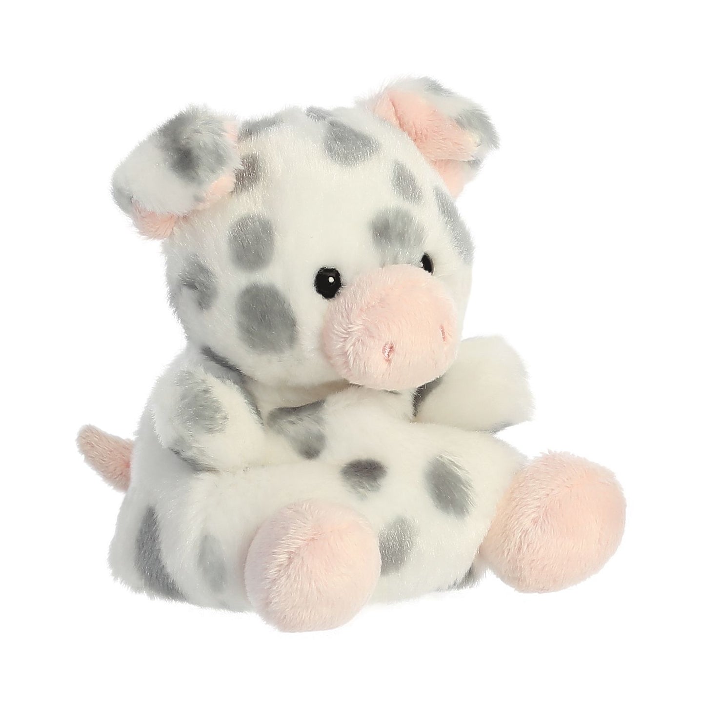 The Twice as Sweet Palm Pal Piggles Spotted Piglet is a palm-sized plush toy with light gray spots, black eyes, and pink snout, ears, and feet—an adorable companion that sits upright, perfect for cuddling.