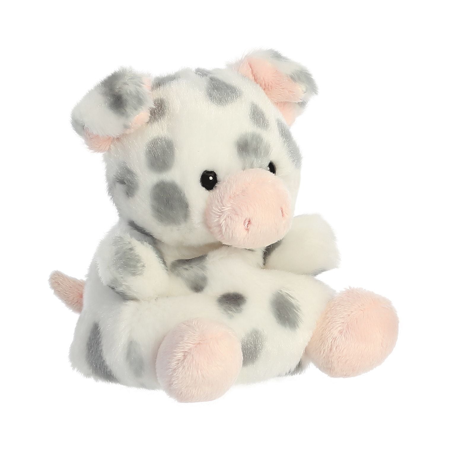 The Twice as Sweet Palm Pal Piggles Spotted Piglet is a palm-sized plush toy with light gray spots, black eyes, and pink snout, ears, and feet—an adorable companion that sits upright, perfect for cuddling.