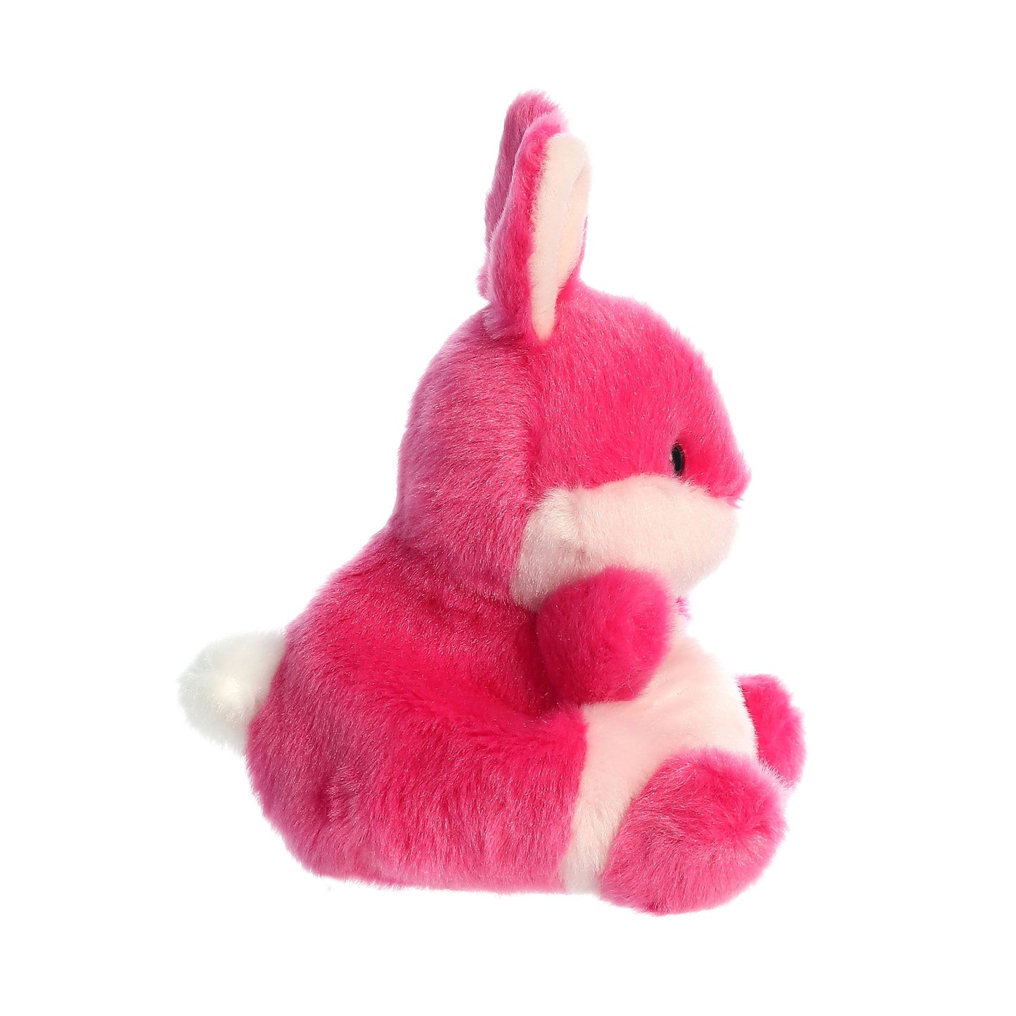 The Twice as Sweet Palm Pal Pixie Pink Bunny is a soft plush with a white belly, muzzle, and tail. It sits upright facing right, features large pink ears and black eyes, making it an adorable stuffed animal.