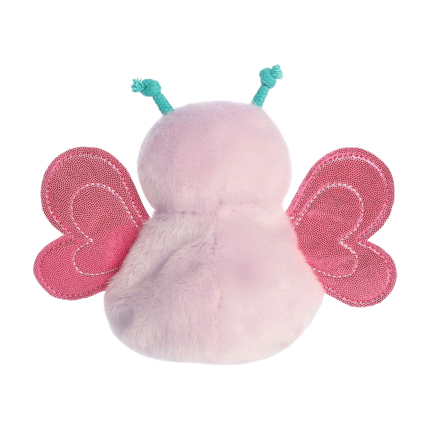 The Twice as Sweet Palm Pal Petunia Butterfly is a plush toy shaped like a butterfly, with a light pink fuzzy body, sparkly pink wings, and two teal antennae on its head, shown from the back.