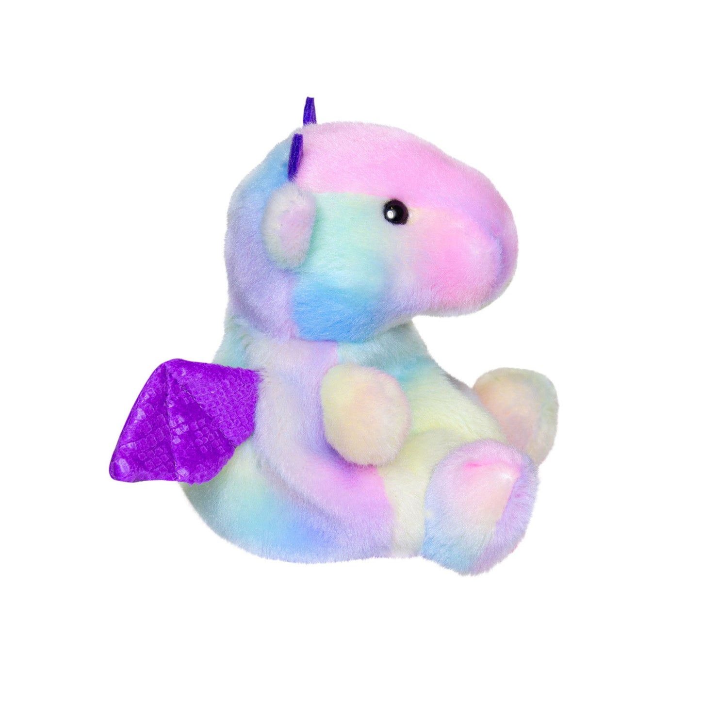 The Palm Pal Aster Dragon by Twice as Sweet features pastel rainbow fur, purple wings, a small purple horn, and black eyes. This adorable plush toy sits upright on a white background—perfect for any collection.