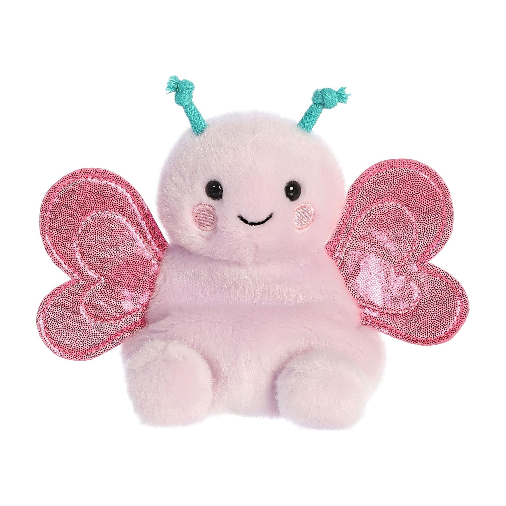 The Palm Pal Petunia Butterfly by Twice as Sweet is a plush pink butterfly with shiny wings, a round smiling face, black eyes, rosy cheeks, and knotted teal antennae—a perfect stuffed animal for any collection!.