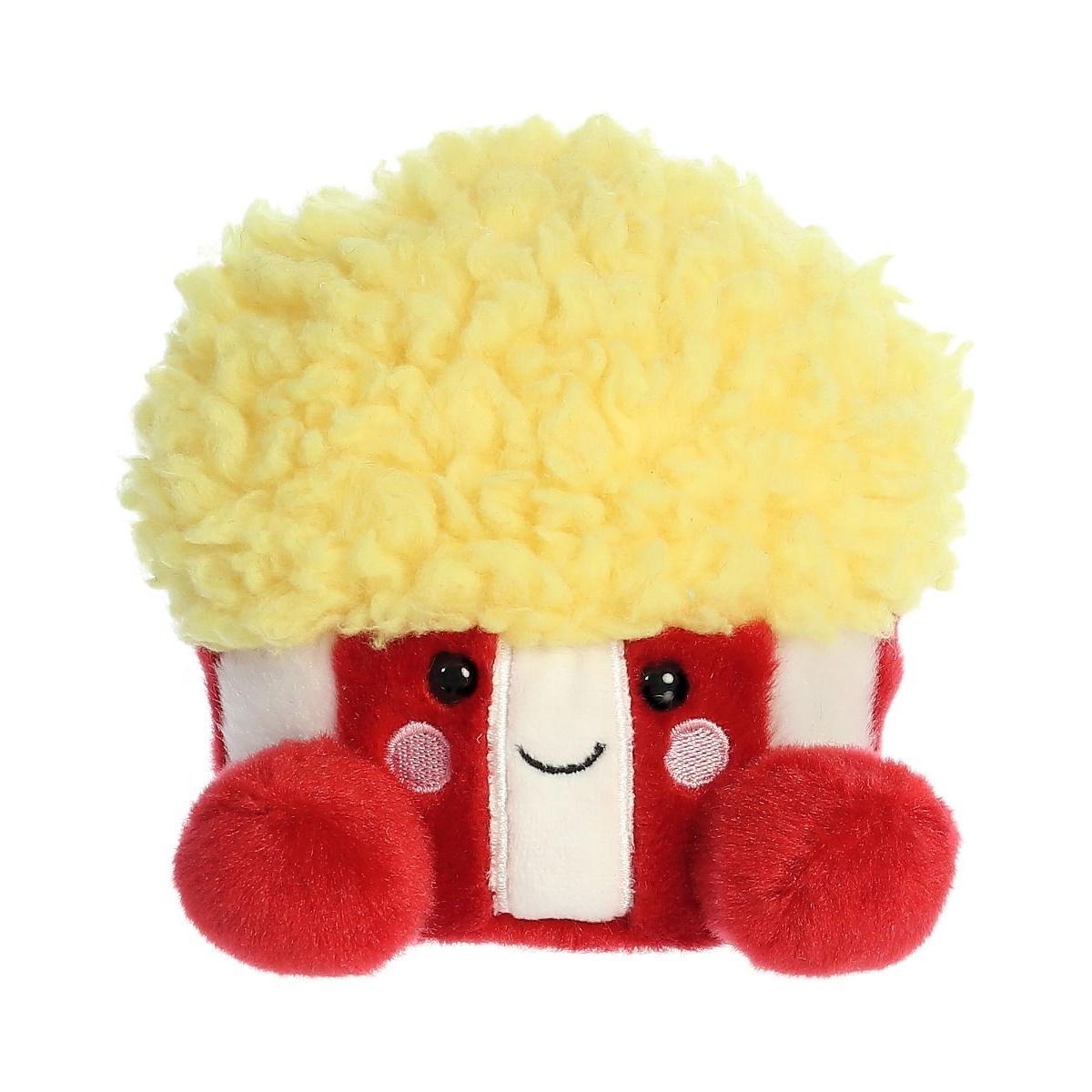 The Twice as Sweet Palm Pal Butters Popcorn is an adorable plush toy shaped like a red-and-white striped popcorn tub with fluffy yellow popcorn on top, black button eyes, a smiling mouth, pink cheeks, and cute red feet—perfect for movie nights.