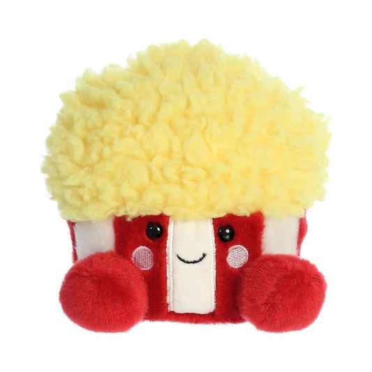 The Twice as Sweet Palm Pal Butters Popcorn is an adorable plush toy shaped like a red-and-white striped popcorn tub with fluffy yellow popcorn on top, black button eyes, a smiling mouth, pink cheeks, and cute red feet—perfect for movie nights.