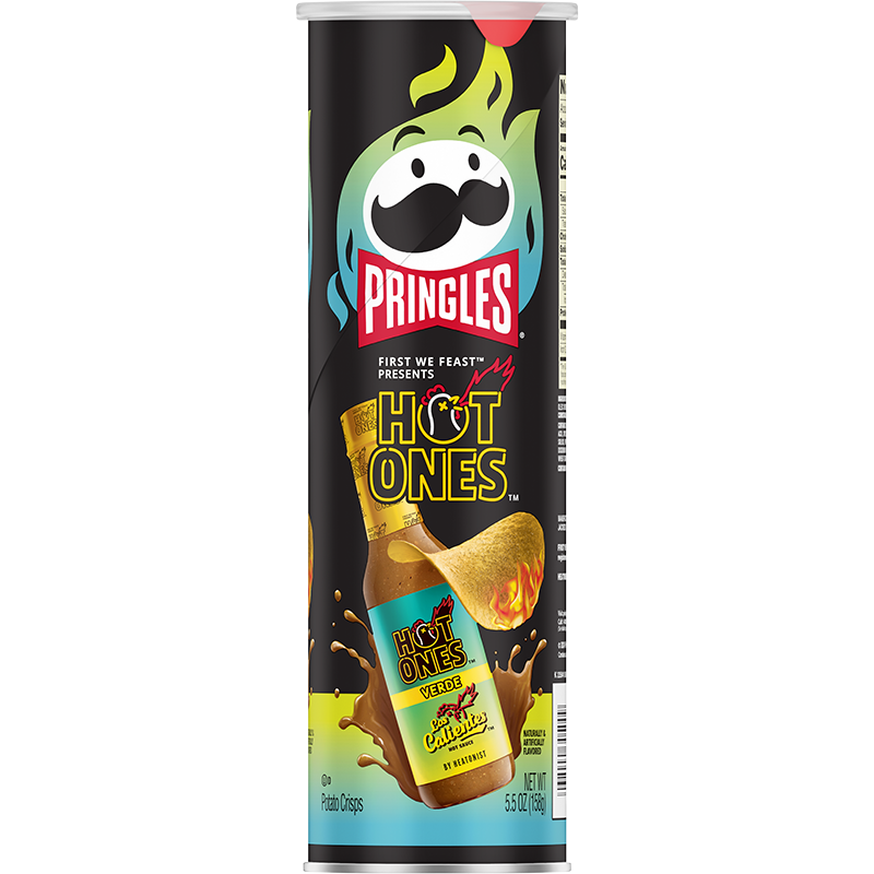 A tall 158g can of Twice as Sweet Pringles Hot Ones Verde (USA) features chips splashing into zesty green chili hot sauce, with bold branding and a fiery spicy snack backdrop.