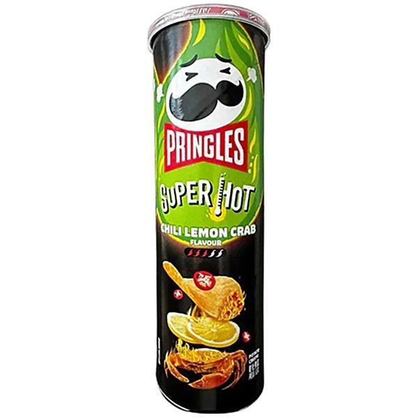A 110g can of Twice as Sweet Pringles Super Hot Chili Lemon Crab from China, a spicy seafood snack. The packaging shows chips, red chili peppers, lemon slices, the mustached logo, and green, black, and red accents.