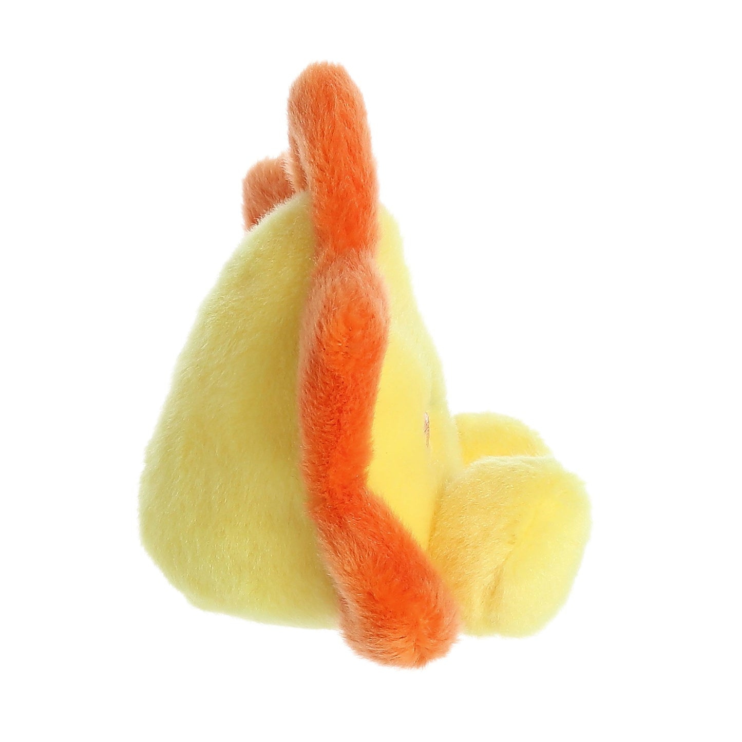 A side view of Palm Pal Rae Sun, a guardian lion plush by Twice as Sweet, featuring soft yellow fur and an orange mane, set against a white background.